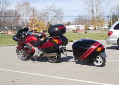 Striped Red Honda Unigo Trailer